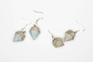 A pair of concrete earrings in the geometric form of diamonds. Duck egg/grey or gray. Silver sterling hooks.