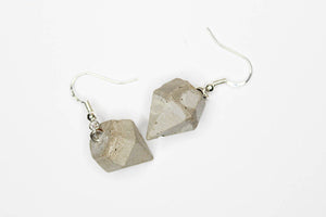 A pair of concrete earrings in the geometric form of diamonds. Duck egg/grey or gray. Silver sterling hooks.